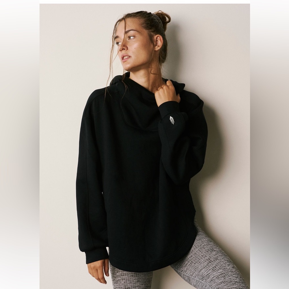 Sweat, amazing fabric on this pullover, runs large..